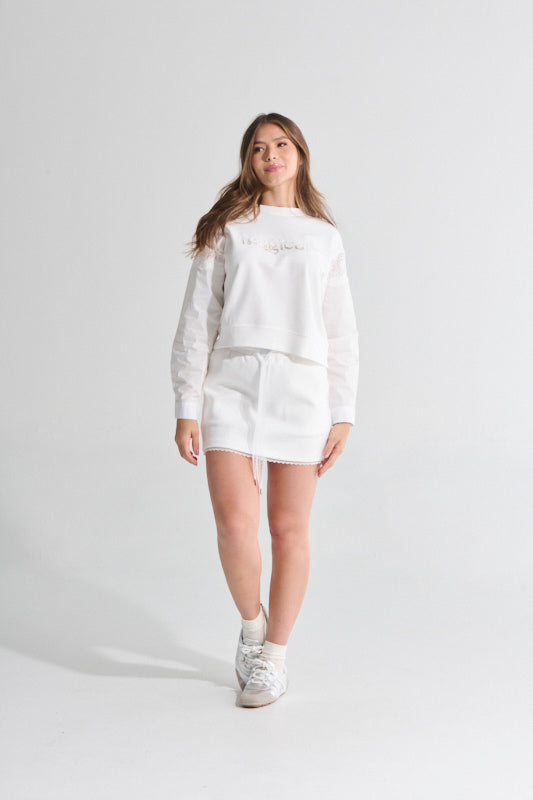 Falda blanca cordón blonda