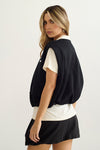 Chaleco negro tipo bomber