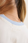 Camiseta cuello azul tejido