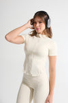 Blusa cierre beige claro
